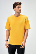 Load image into Gallery viewer, Heavyweight Oversize Solid T-Shirt Mustard Yellow.
